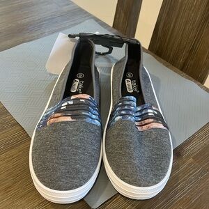 Size 9 women’s slip on shoes, gray with a little blue and brown, new with tags